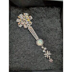 Kirks Folly Snowflake Brooch With Moon Face Rhinestones & Dangling Charms